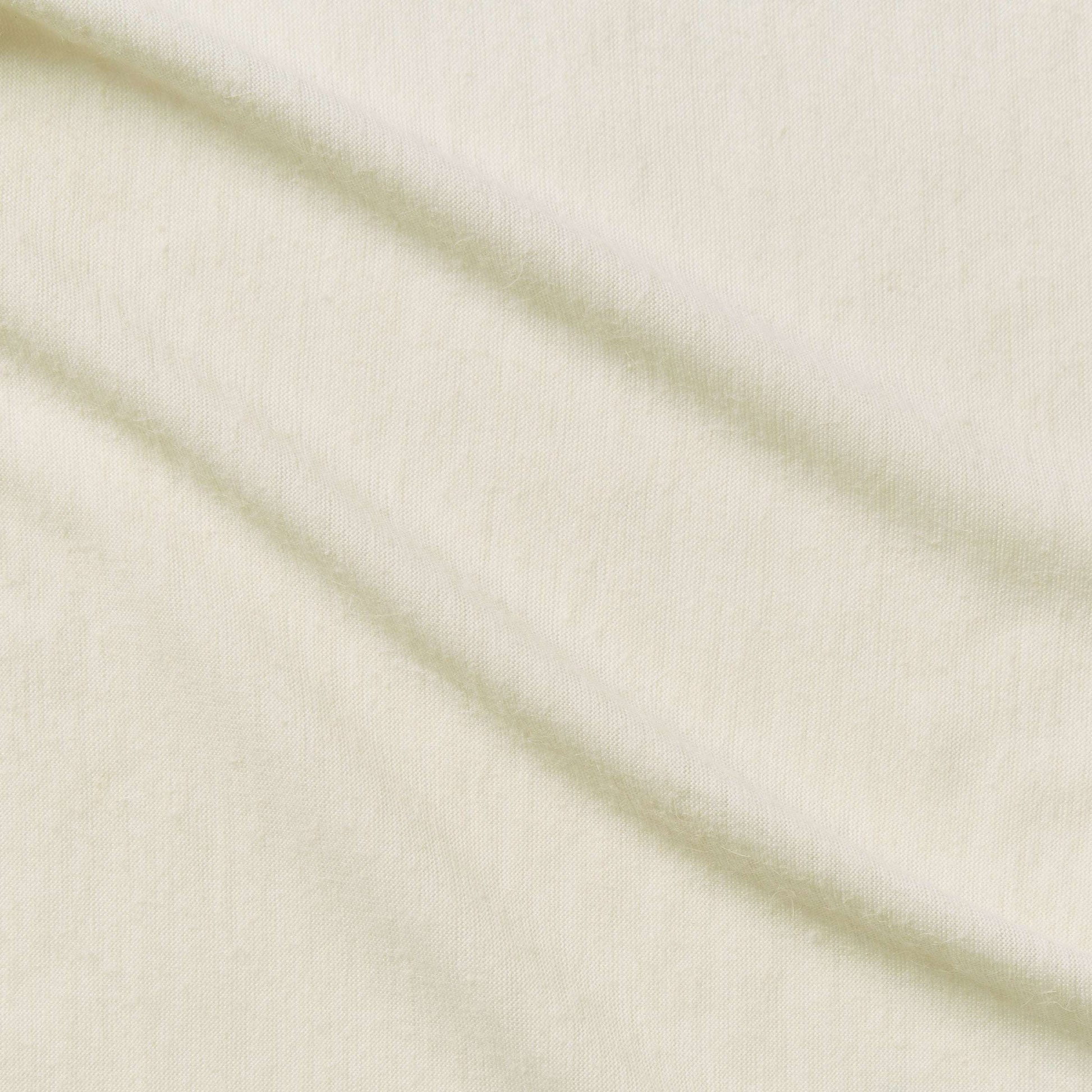 angora presenting the ivory color version with stretch knit warm angora hand feel from a acrylic and polyester blend