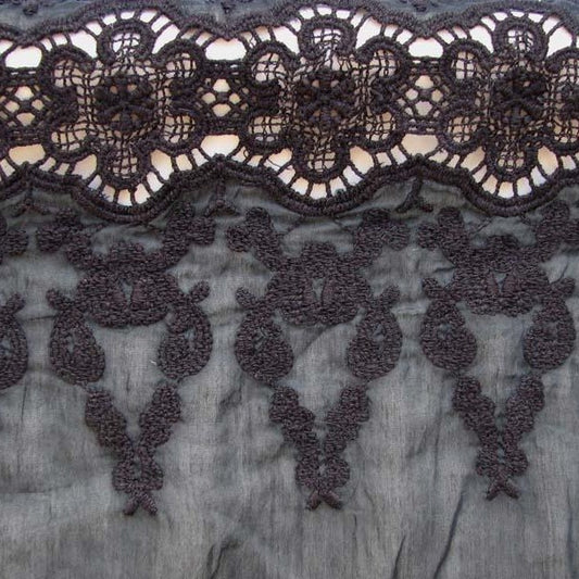 Exhibiting Aero a Silk and cotton blend featuring double border embroidery