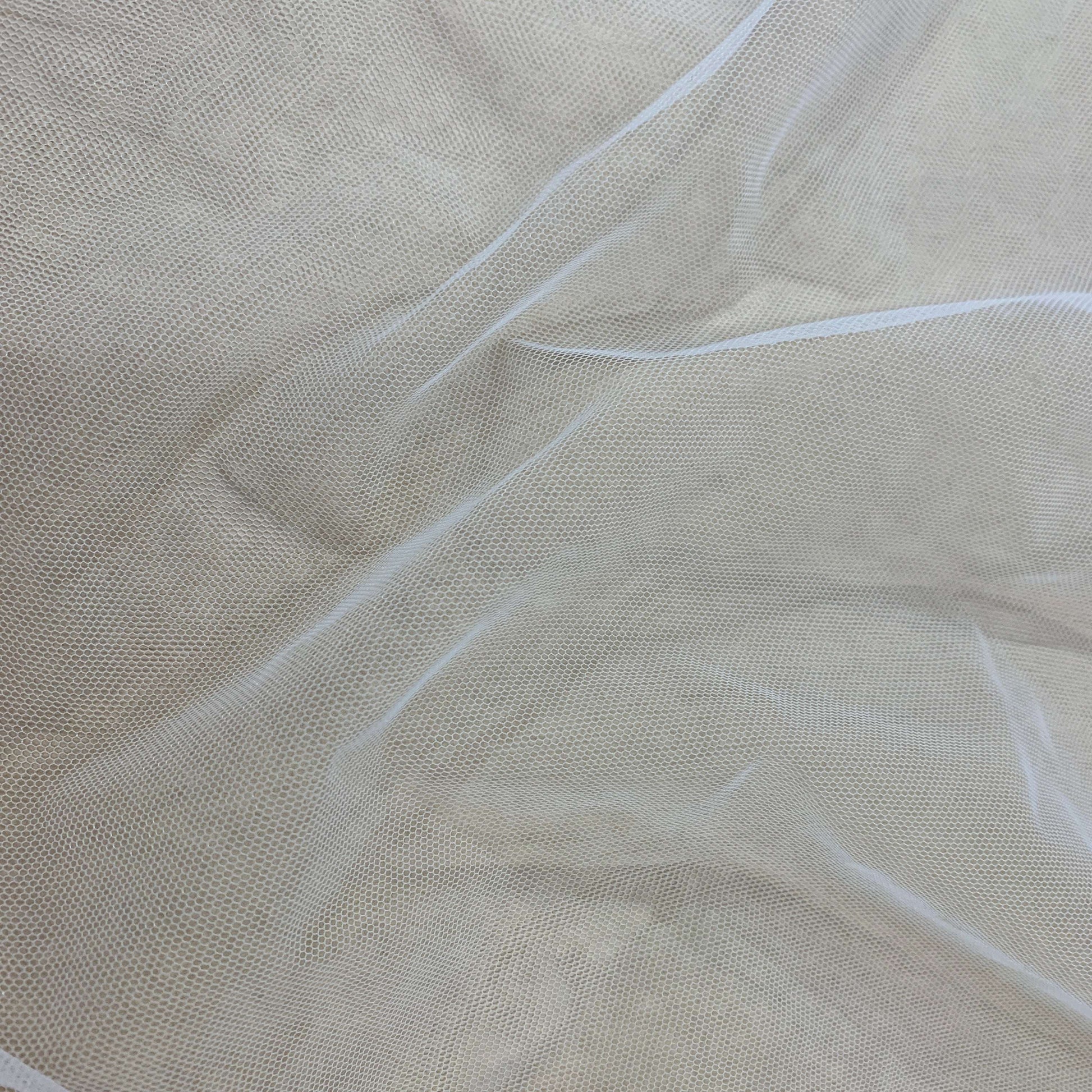 Presenting Angel Tulle an ivory colored sheer soft pure nylon tulle