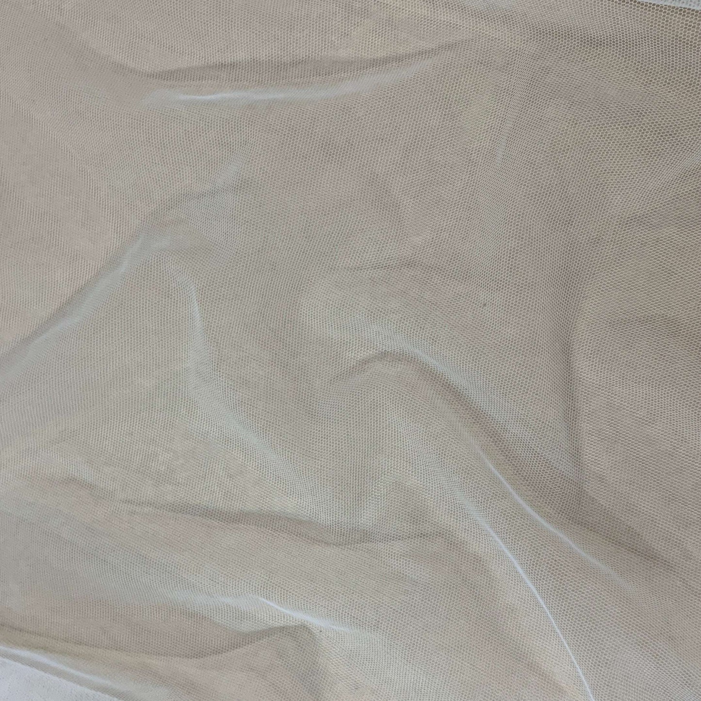 Presenting Angel Tulle an ivory colored sheer soft pure nylon tulle