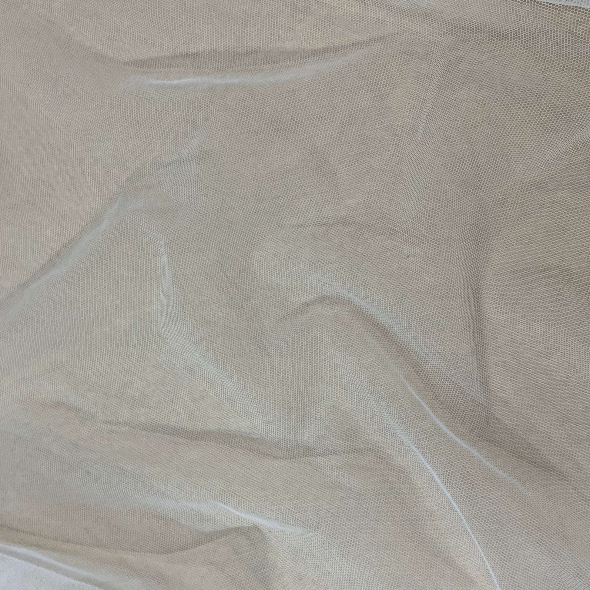 Presenting Angel Tulle an ivory colored sheer soft pure nylon tulle