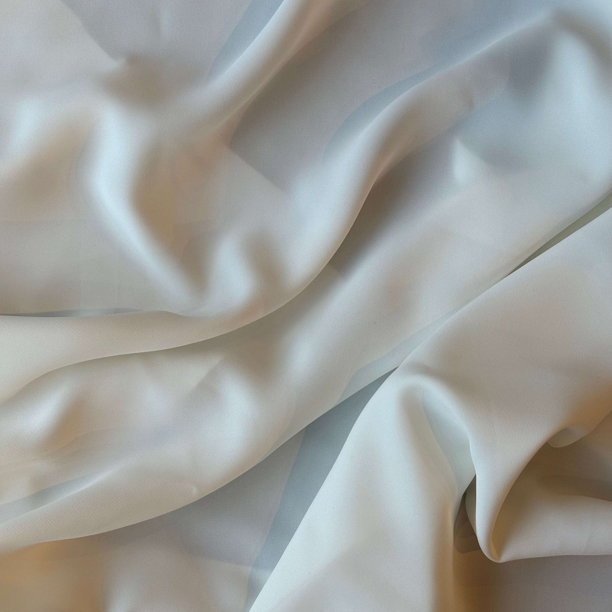 Presenting Bliss a dressweight ivory Poly weft stretch yarn fabric