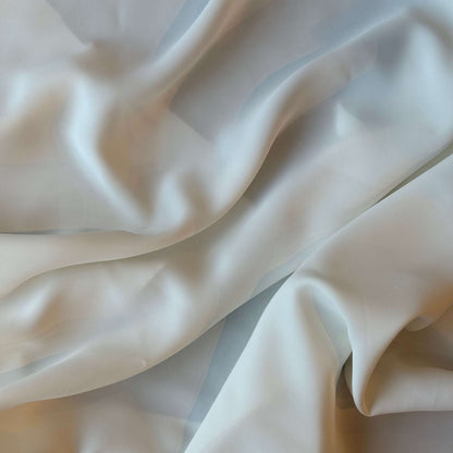 Presenting Bliss a dressweight ivory Poly weft stretch yarn fabric