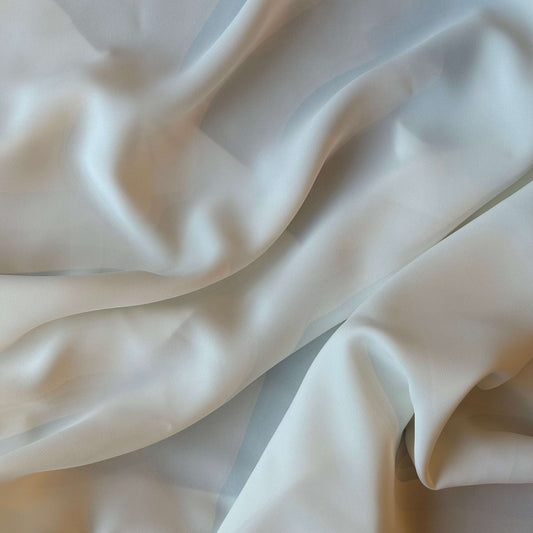 Presenting Bliss a dressweight ivory Poly weft stretch yarn fabric