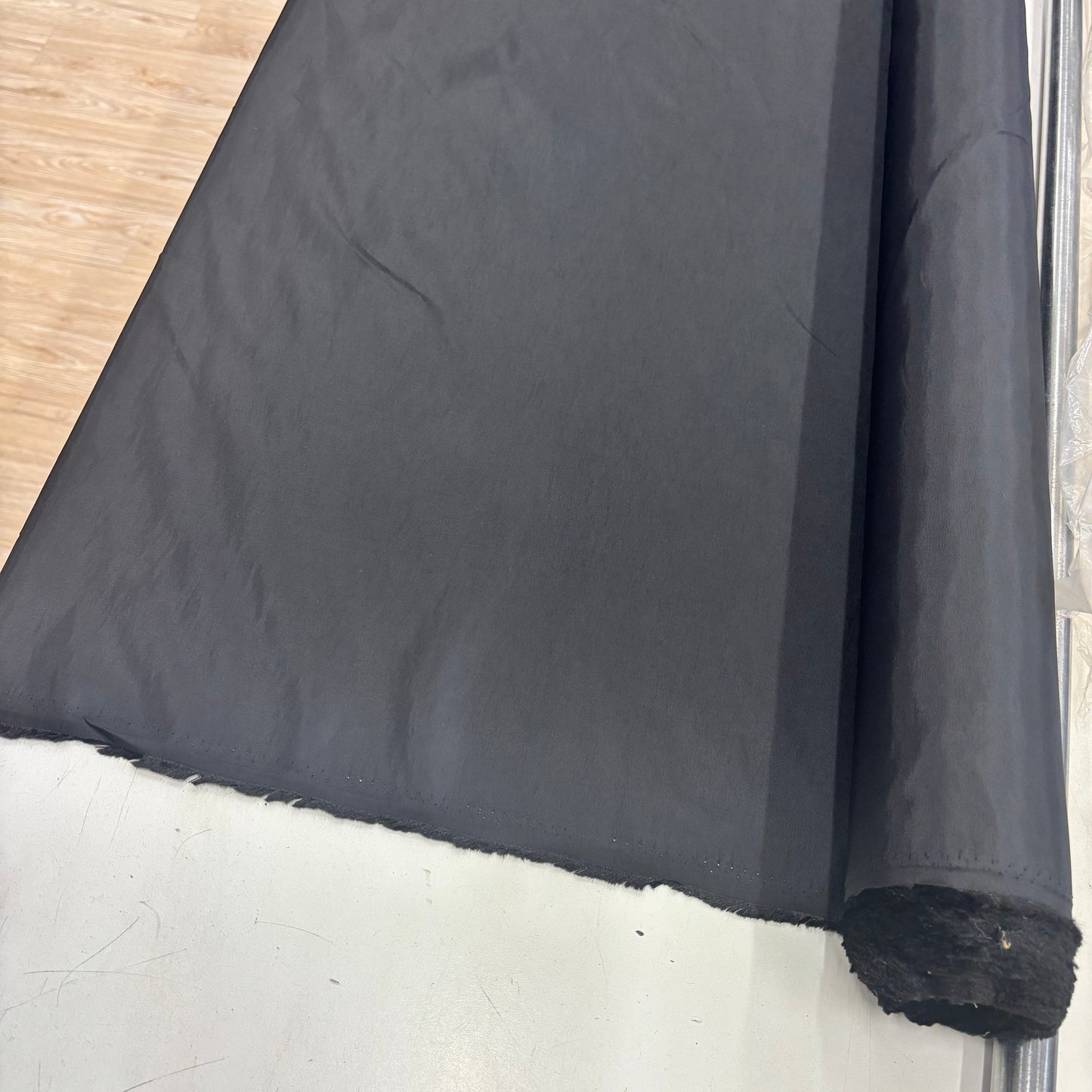 Displaying a Roll of the Blowout black fabric
