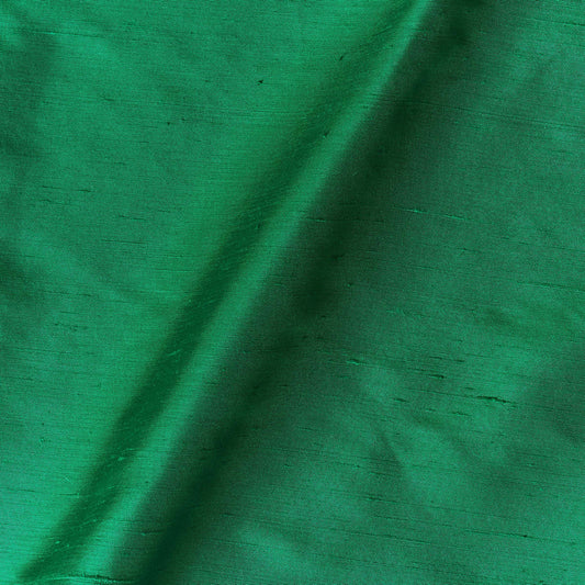 Presenting Bohai Dupion pure silk in an emerald shade with moderate drape