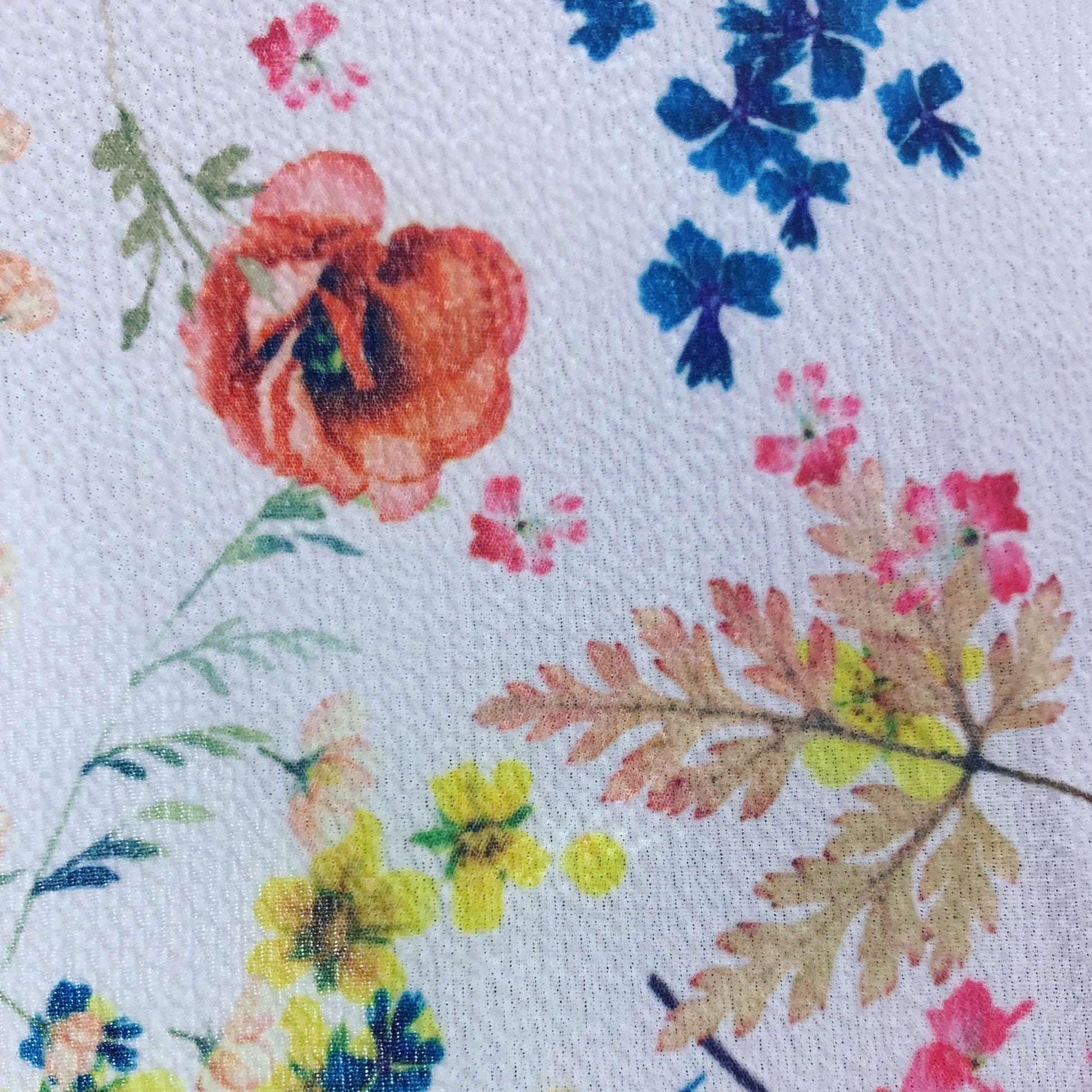 Bubble presenting the bright floral print version featuring soft light weight stretch crepe-weave  polyester with spandex featuring great drape