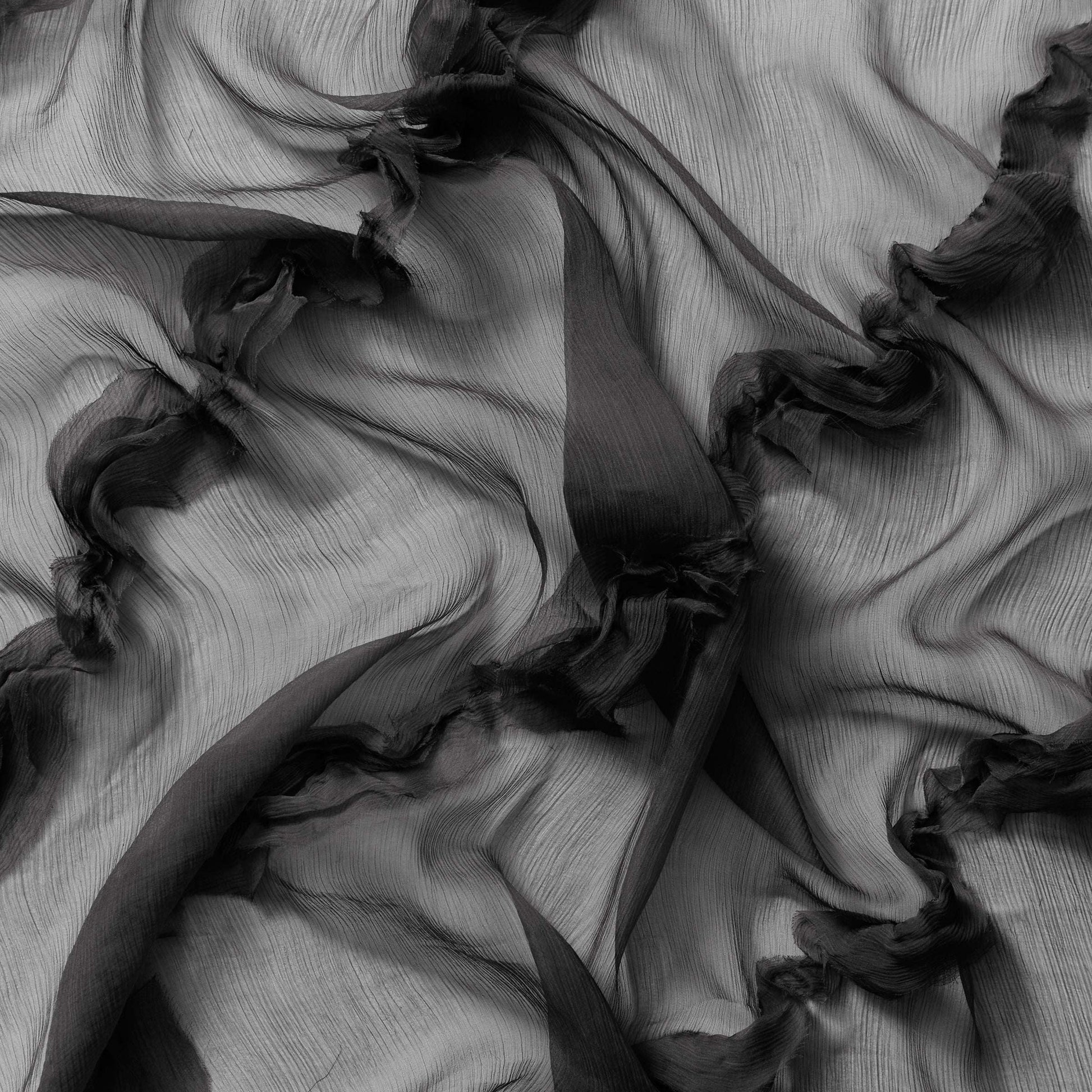 cascade presenting the black colored version crinkle light weight sheer pure silk chiffon with diagonal ruffle flounce 