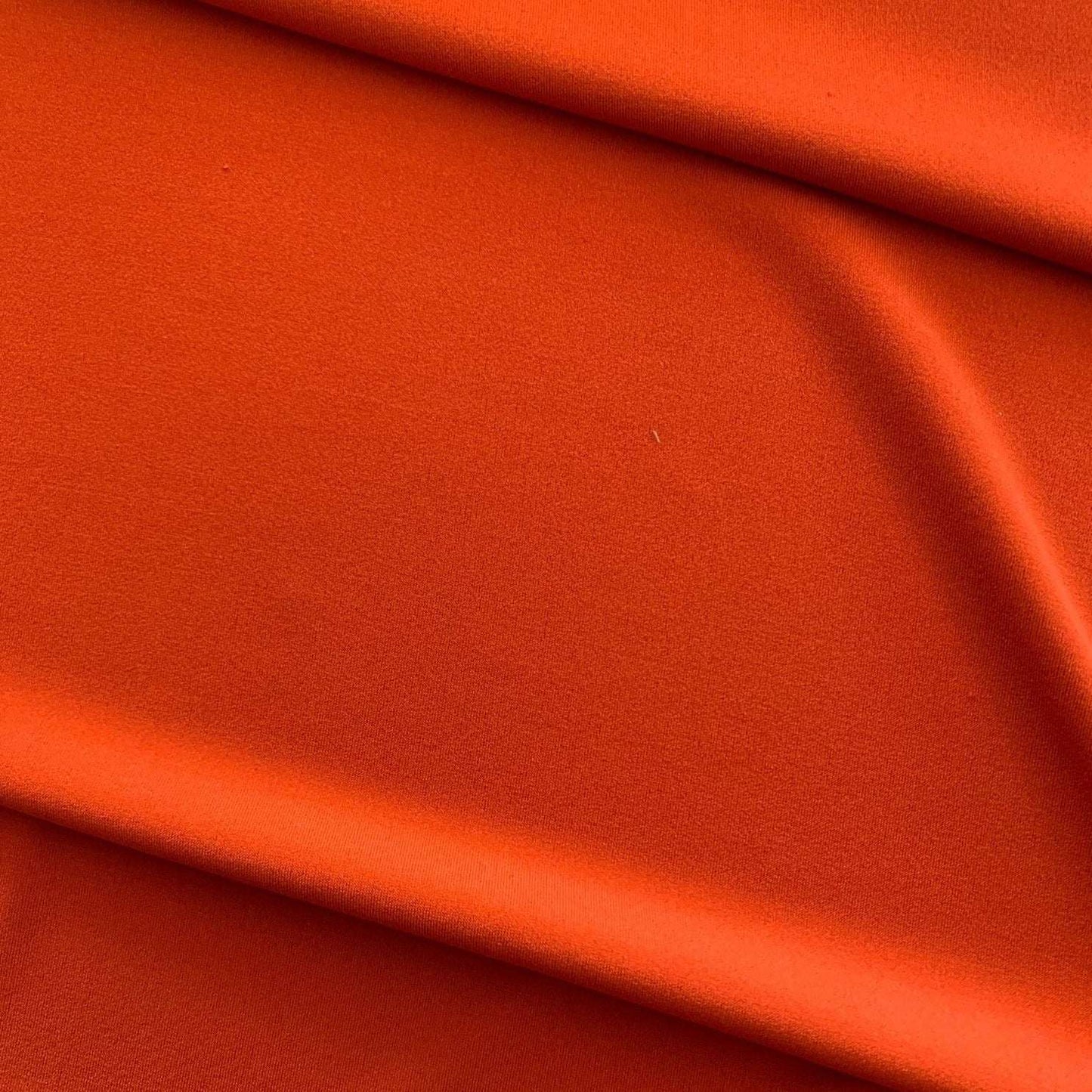 cavalli presenting the tangerine color version with stretch smooth fine knit jersey polyester with added spandex