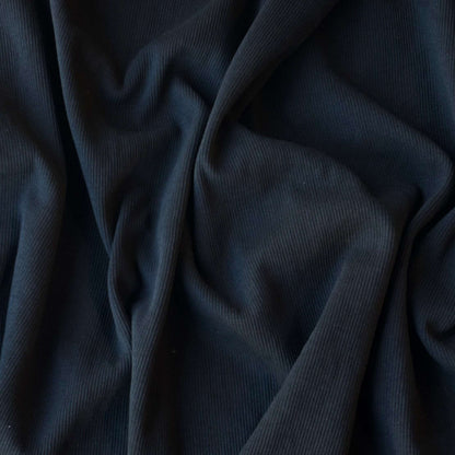 Cotton Rib presenting the Black version of a heavyweight fine pure cotton fabric