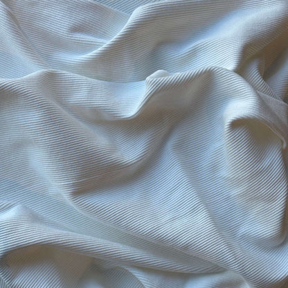 Cotton Rib presenting the Off White version of a heavyweight fine pure cotton fabric