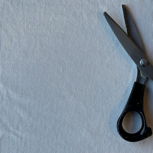 Presenting Cotton Rib a pure fine cotton heavyweight fabric which is a classic for womens tops and dresses shown with a pair of scissors for scale