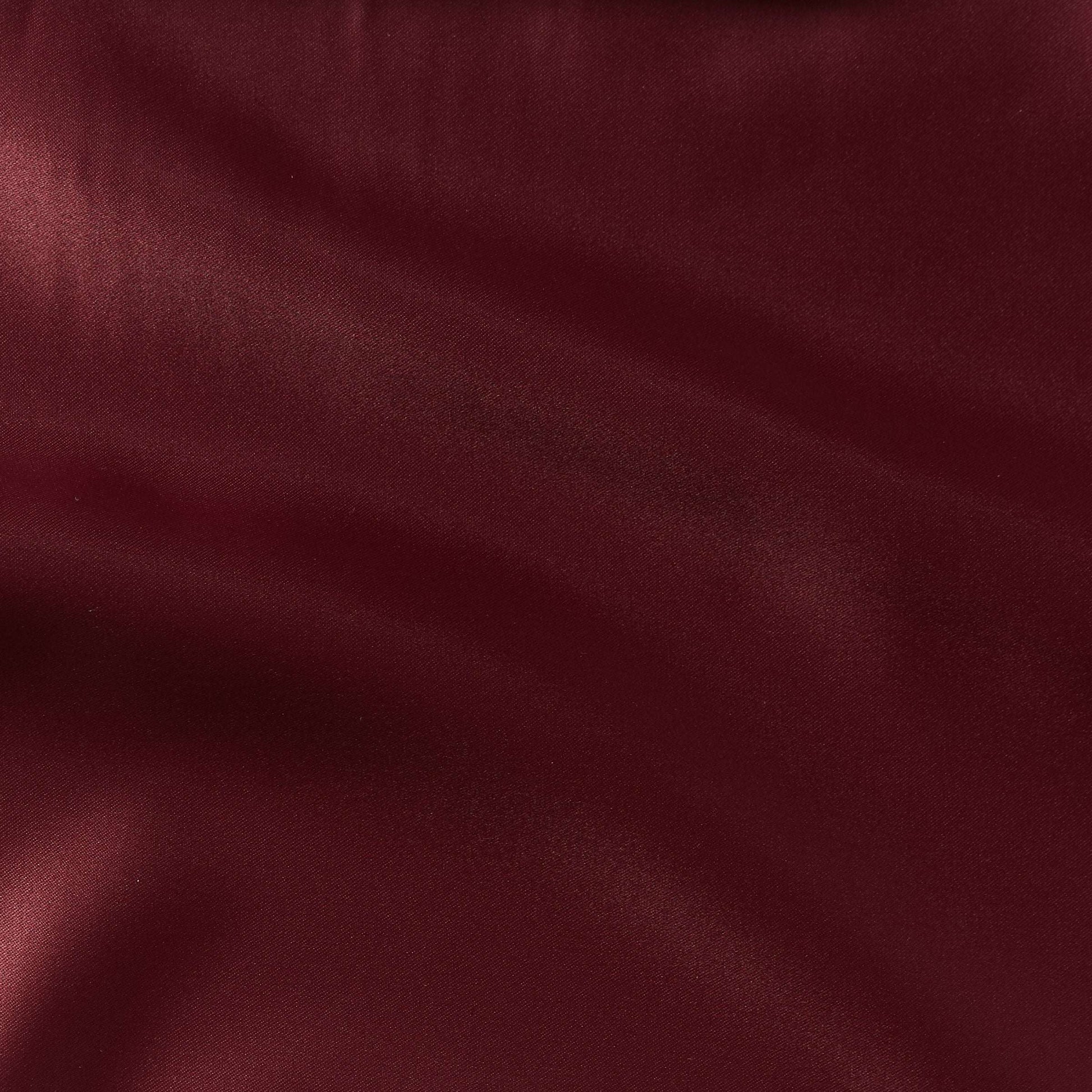 countess presenting the burgundy color version of a crisp satin pure polyester fabric with moderate drape