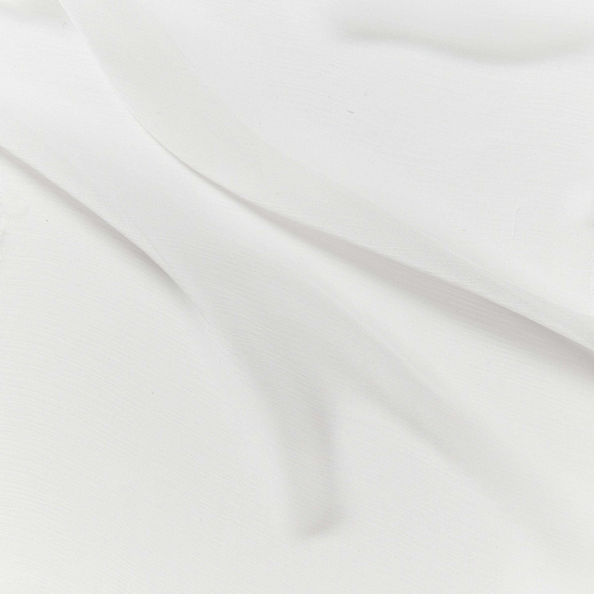 silk crinkle chiffon showing the natural color version of a sheer soft pure silk with textured yoryu weave and fluid drape