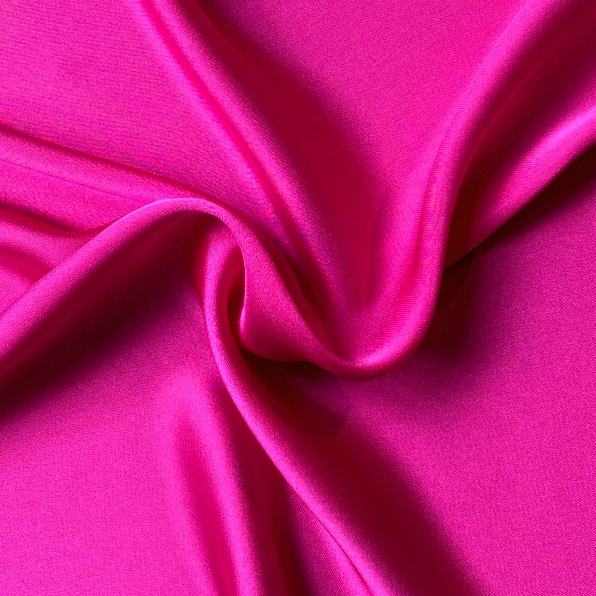 Deluxe presenting the fuchsia color version of a satin colored chiffon silk like pure polyester with fluid drape