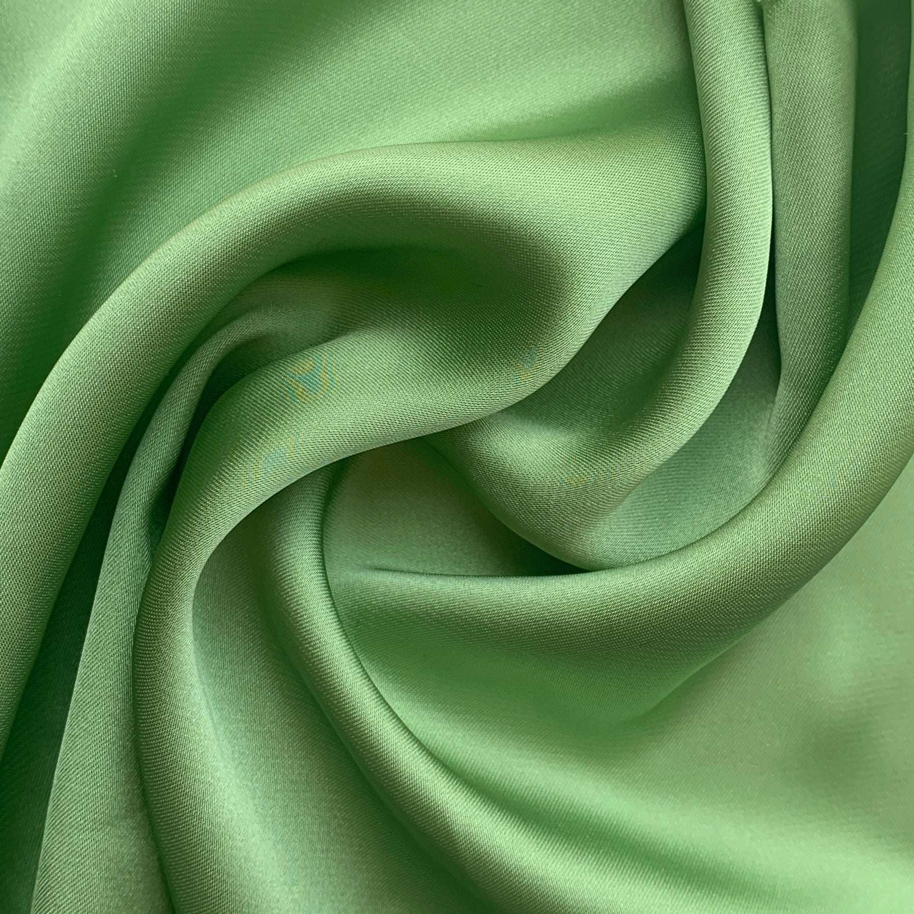 Deluxe presenting the lettuce color version of a satin chiffon silk like pure polyester with fluid drape