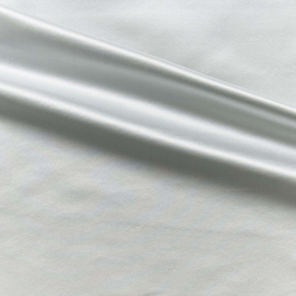 Duchess showing the pale blue color version on heavy weight mulberry silk satin with moderate drape