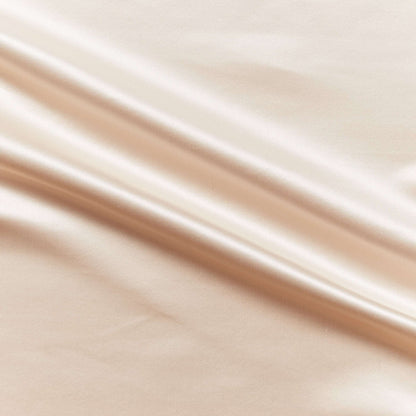 Duchess showing the shell color version on heavy weight mulberry silk satin with moderate drape