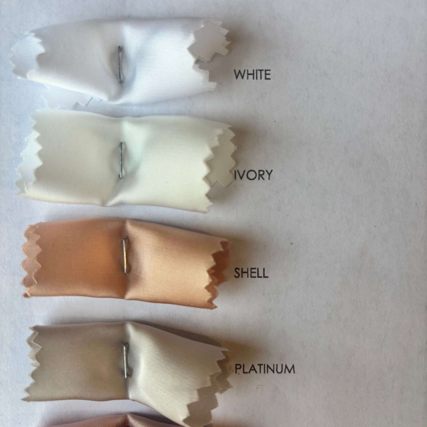 Presenting the Deluxe color swatches of white, ivory, shell and Platinium