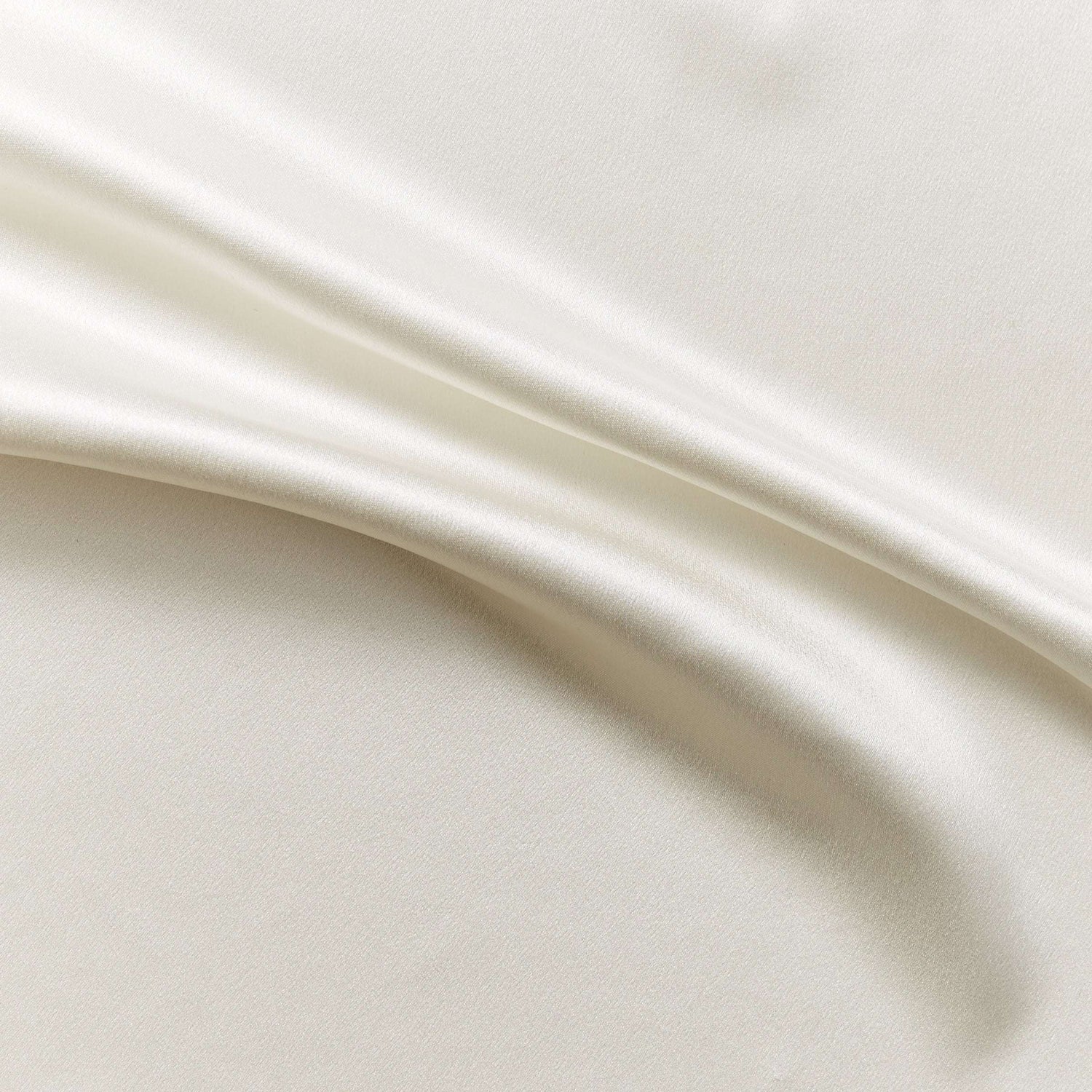 Eternity exhibiting the natural color version of a heavy weight pure mulberry silk satin with fluid drape