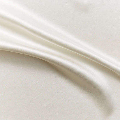 Eternity presenting the natural color version of a heavy weight pure mulberry silk satin with fluid drape