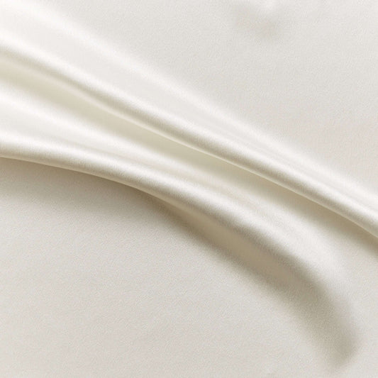 Eternity showing the natural color version of a heavy weight pure mulberry silk satin with fluid drape