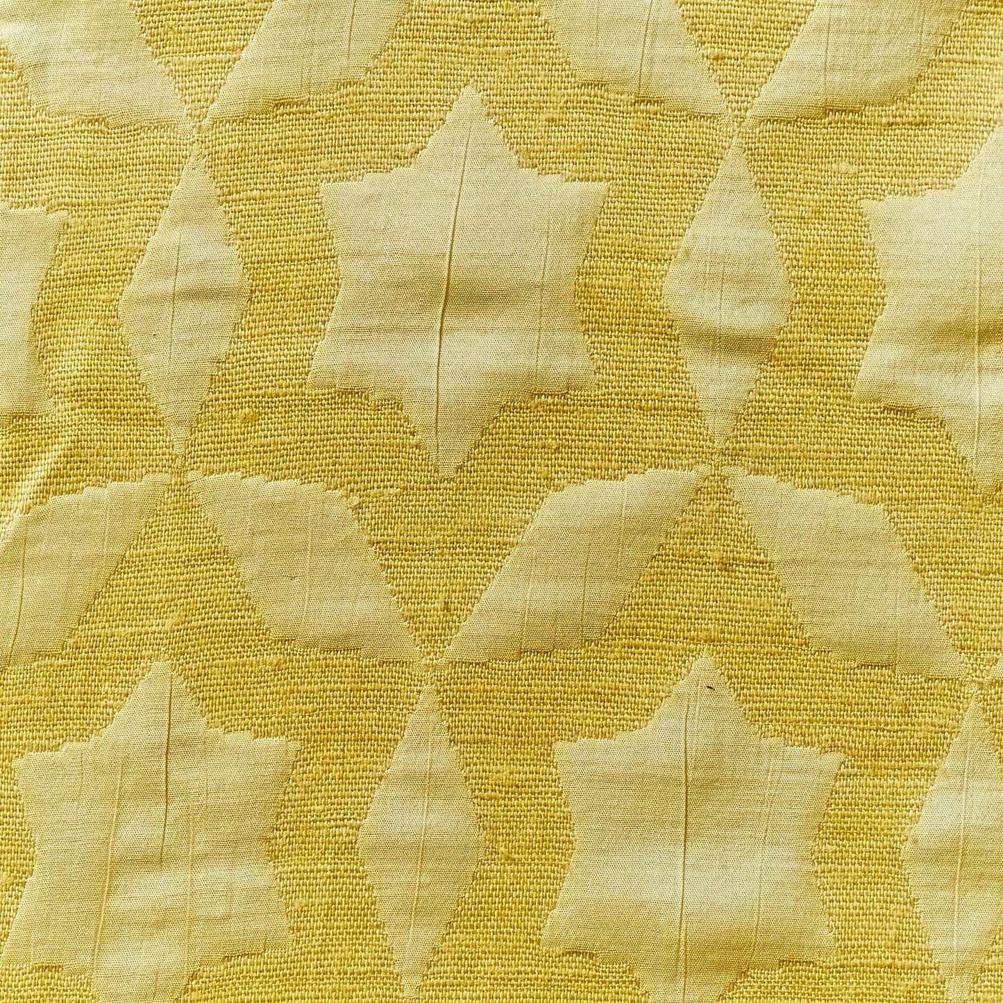 fame presenting the gold colored Raw pure silk with geometric star designed jacquard with moderate drape