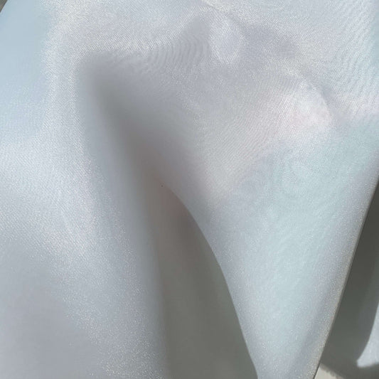 Presenting Gazar Satin Organza a ivory colored lustrous poly organza with a soft hand-feel