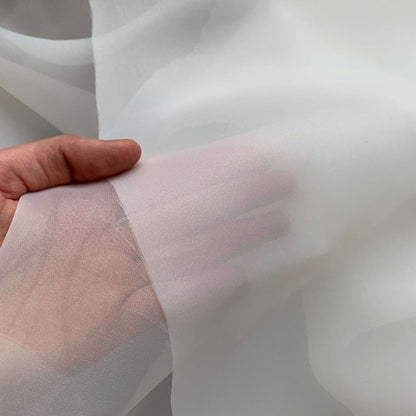 Presenting Gazar Satin Organza a ivory colored lustrous poly organza with a soft hand-feel showing sheerness