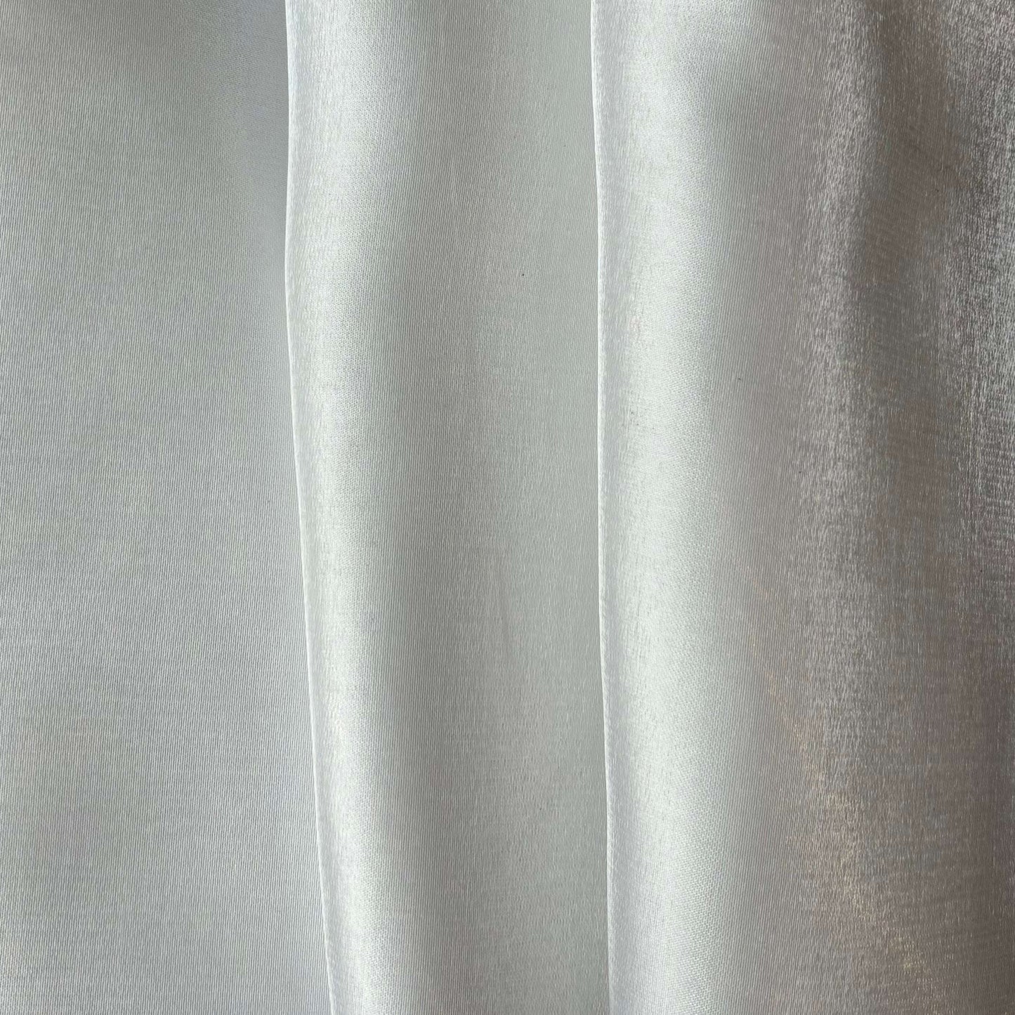 Presenting Glace a pure polyester bridal or evening wear fabric with a mirror finish in a ivory colour