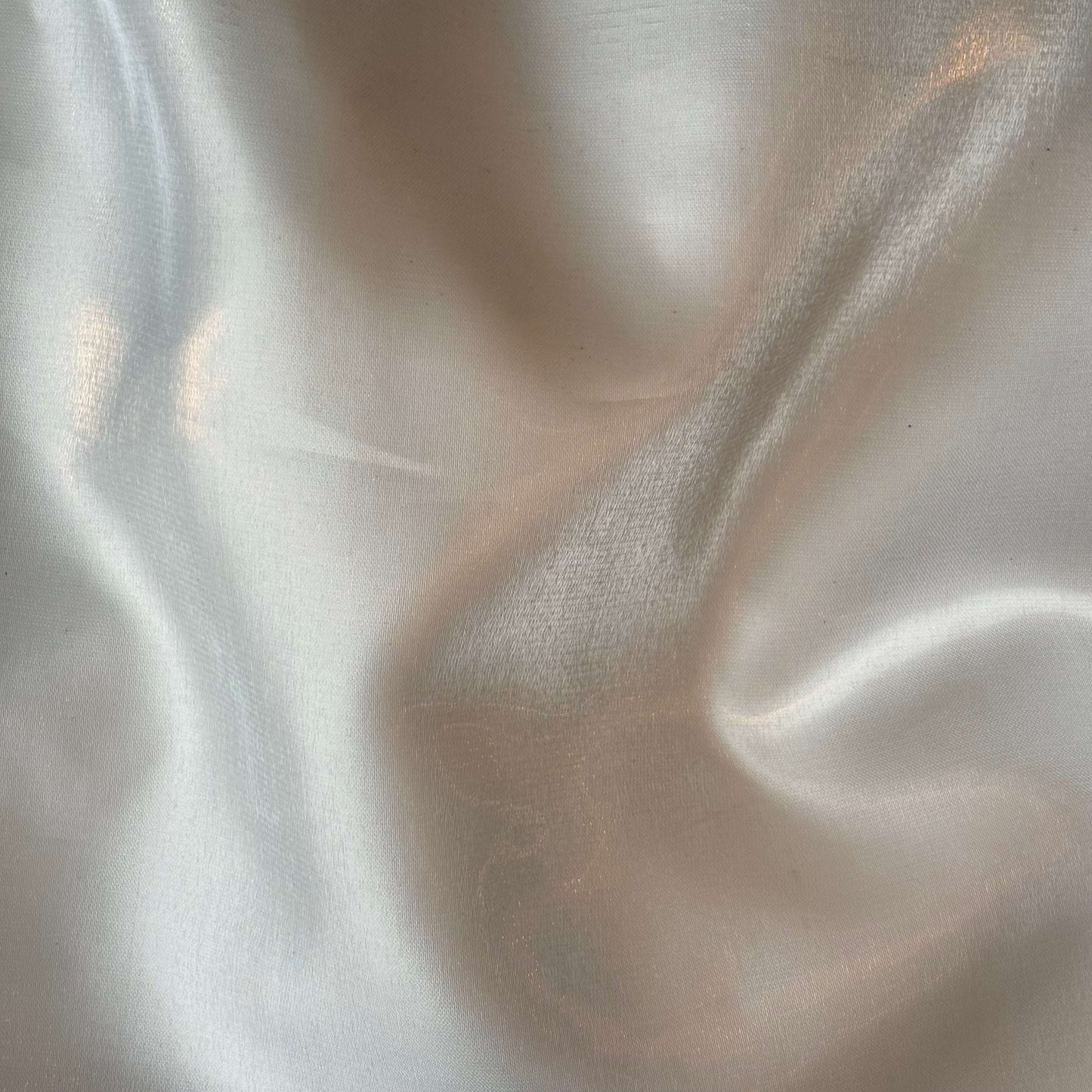 Presenting Glace a pure polyester bridal or evening wear fabric with a mirror finish in a ivory colour