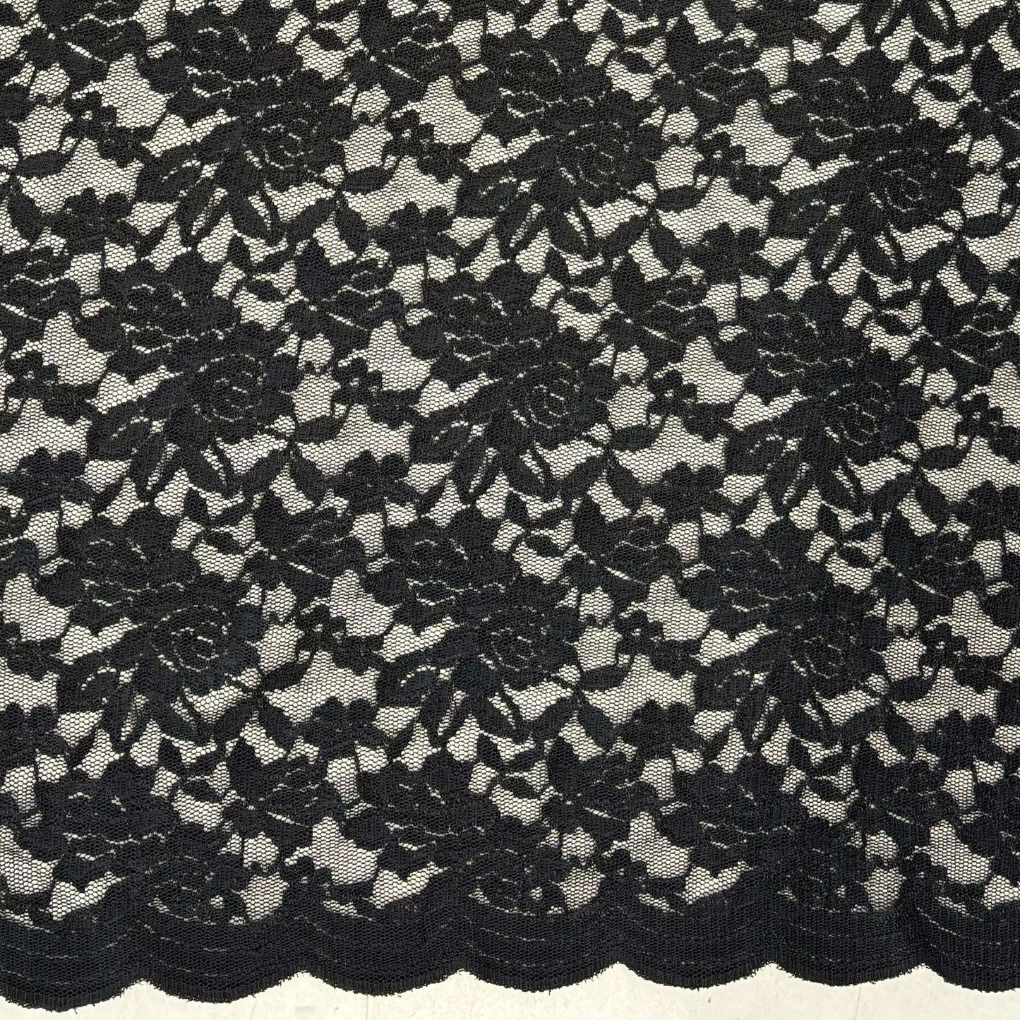Presenting Dash Stretch Lace black cclored spandex and polyester blended floral body weight stretchable  lace fabric