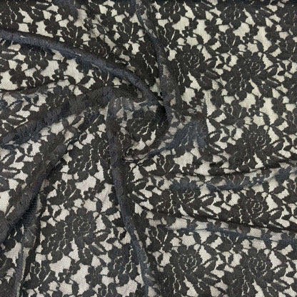 Presenting Dash Stretch Lace black cclored spandex and polyester blended floral body weight stretchable  lace fabric