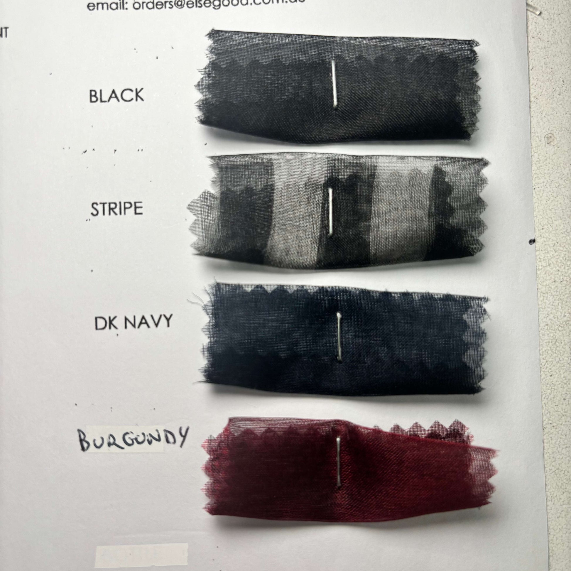 Showing the black, stripe, dark navy and burgandy swatches from the Silk Organza Color Card
