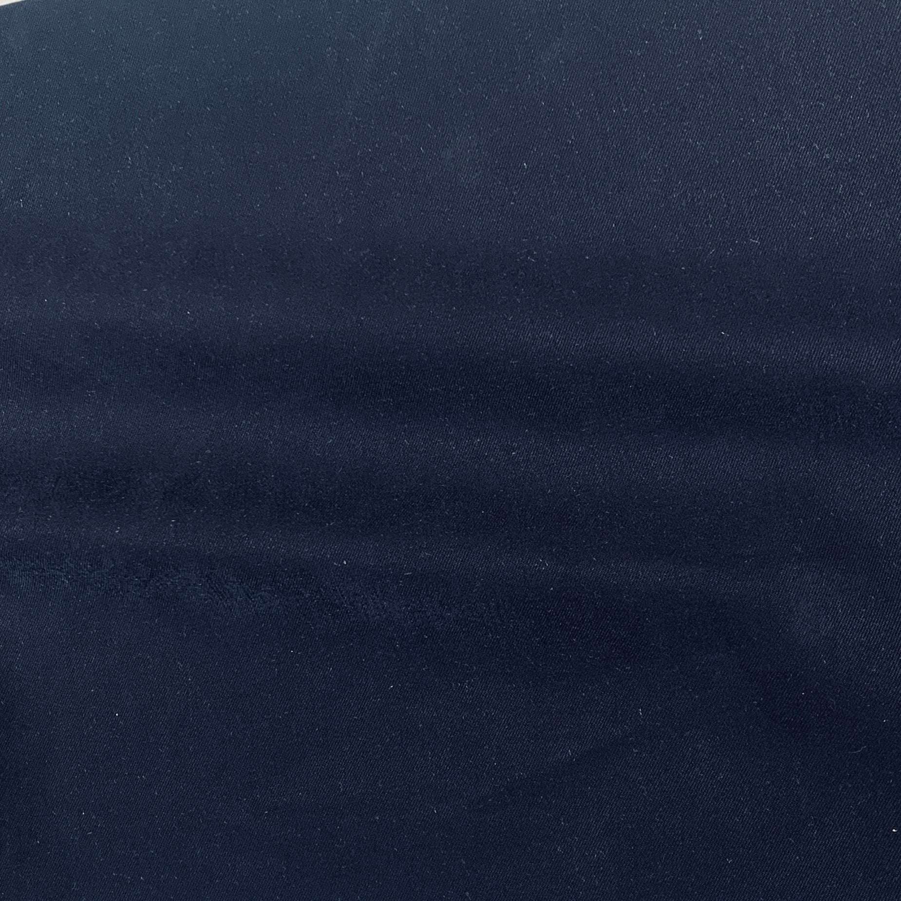 Hero presenting the black color version of a stretch model blend with lycra and poly bottom weighted