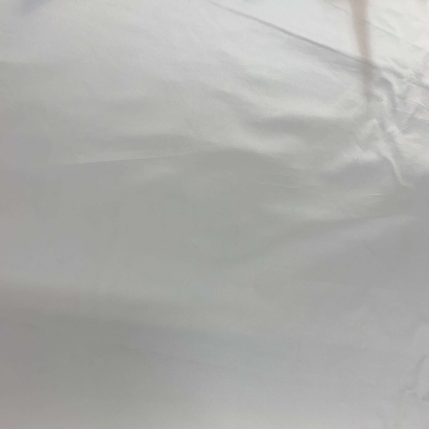 Showing Duchess SC an ivory colored Smooth, heavy weight silk and cotton blend with moderate drape