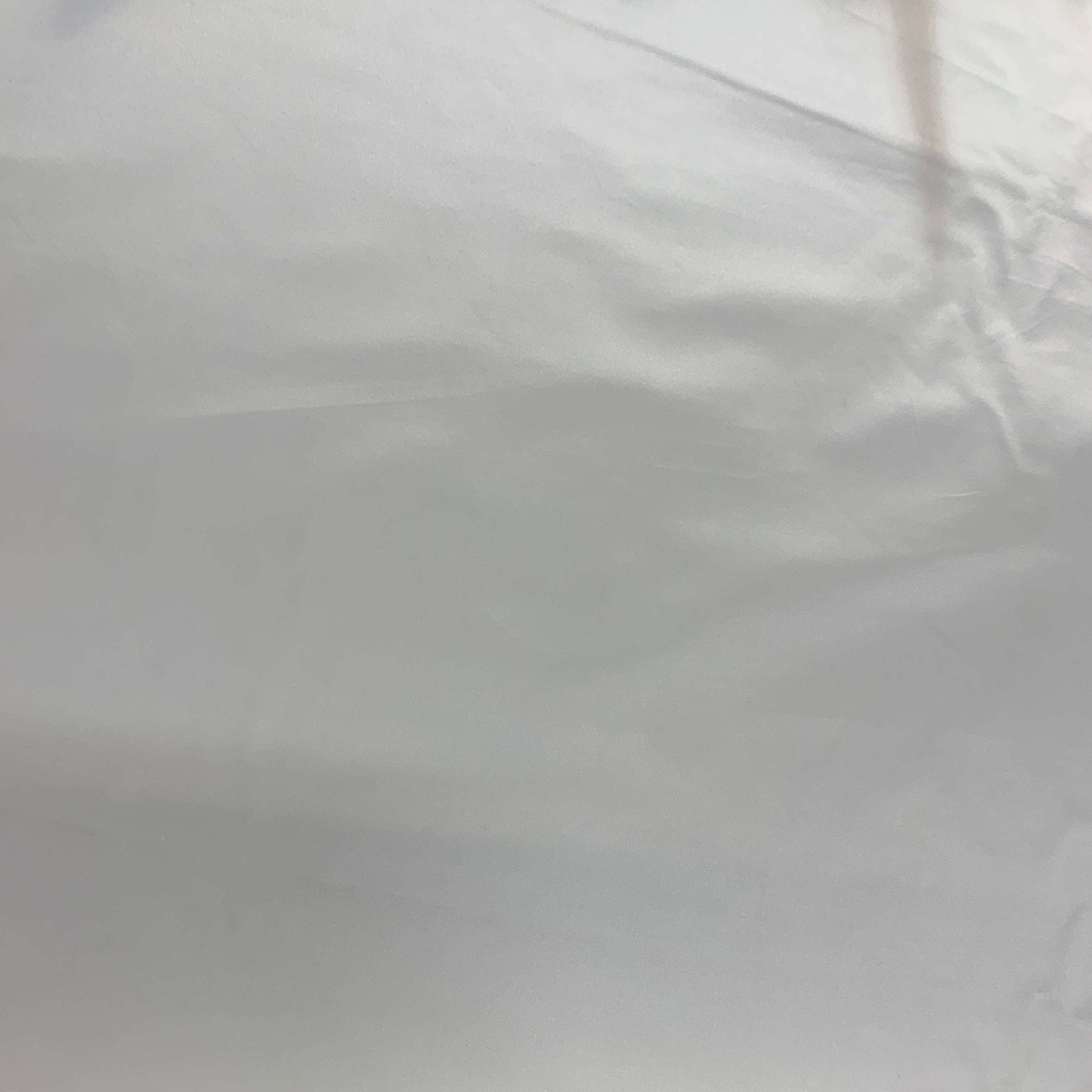 Showing Duchess SC an ivory colored Smooth, heavy weight silk and cotton blend with moderate drape