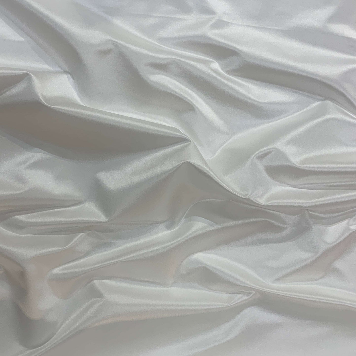 Showing Duchess SC an ivory colored Smooth, heavy weight silk and cotton blend with moderate drape