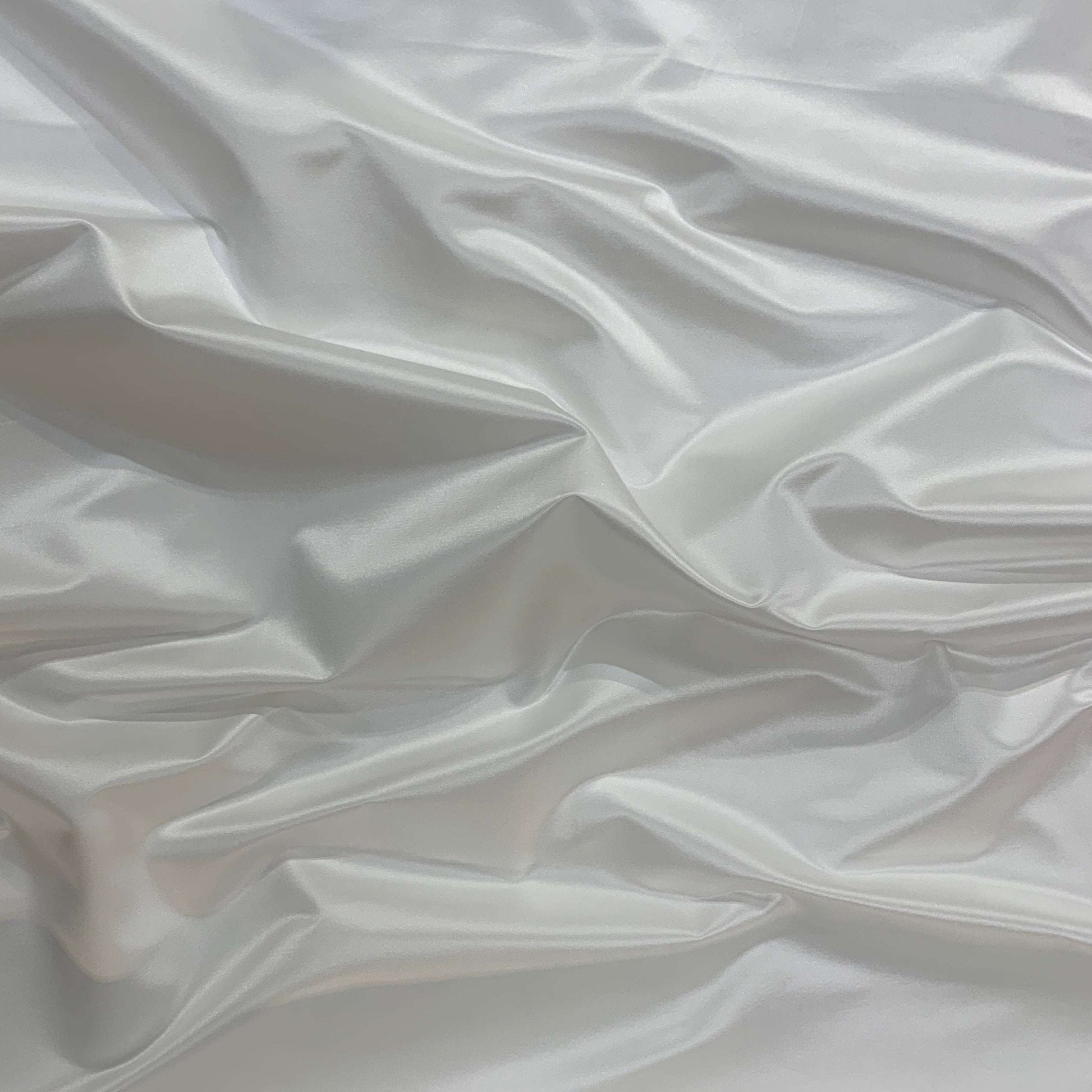 Showing Duchess SC an ivory colored Smooth, heavy weight silk and cotton blend with moderate drape