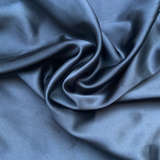 stretch silk satin showing the black color version of a silk and lycra blend with great drape