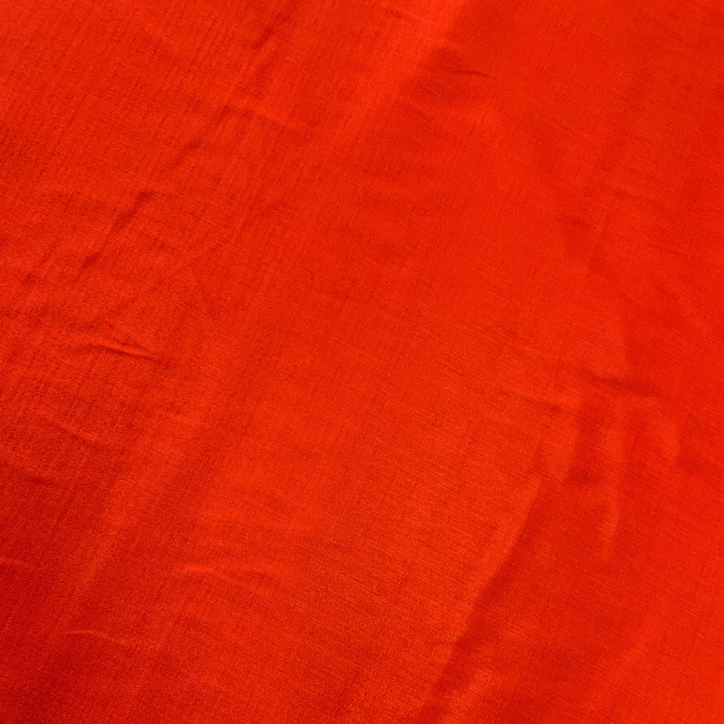 Presenting the Linus fire colored rayon and polyester blend with a sateen sheen