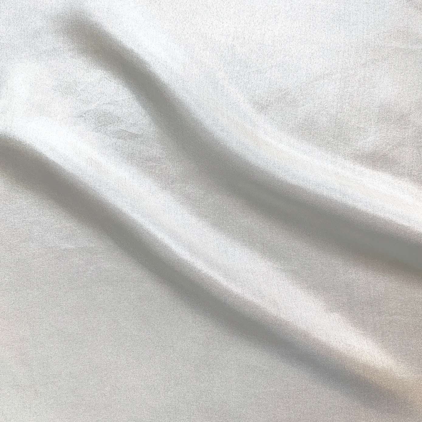 jap silk 115cm presenting the natural color version of a light weight mulberry pure silk with fluid drape and natural sheen