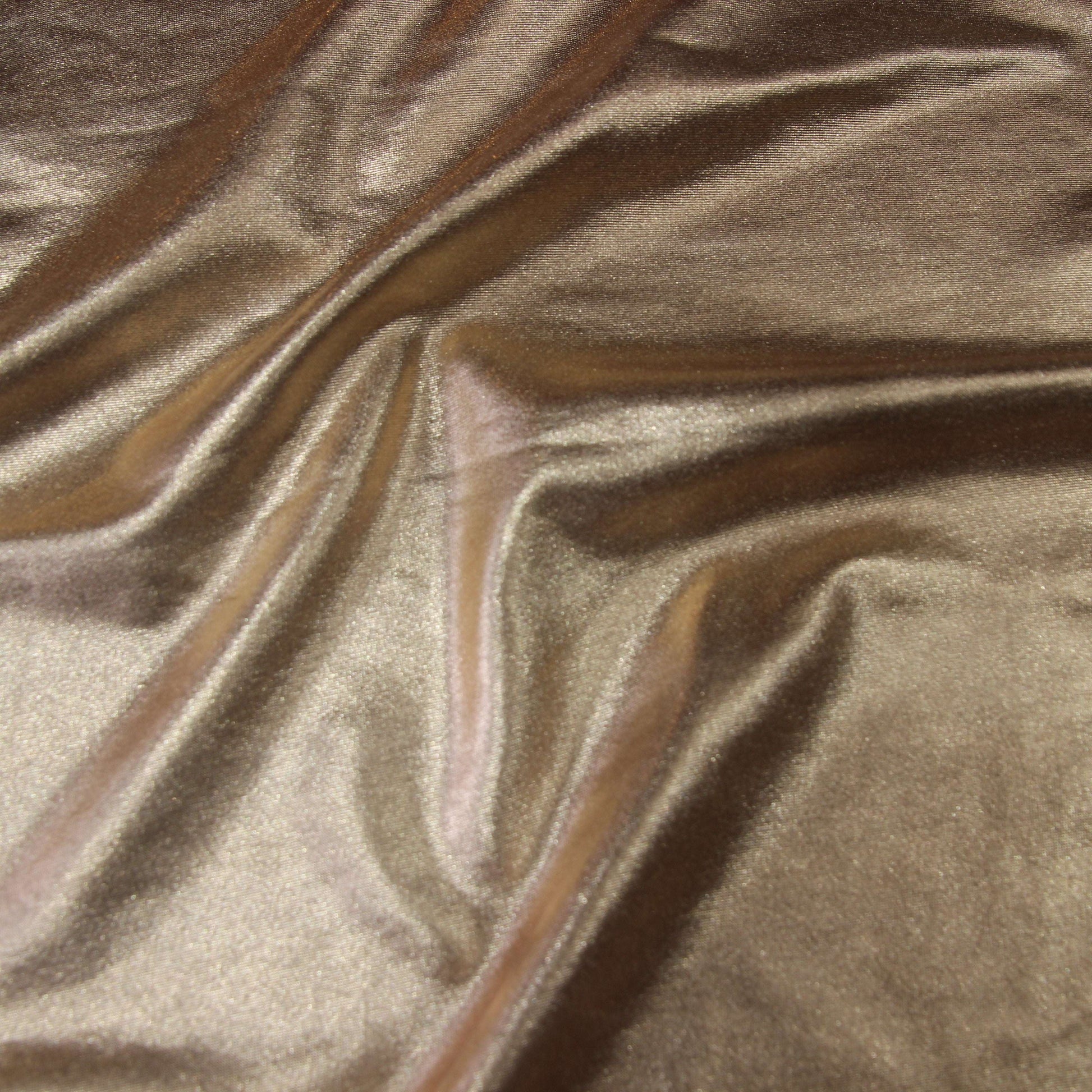 Metallica presenting the Gold color version of a stretch shiny polyester and spandex blend with good drape