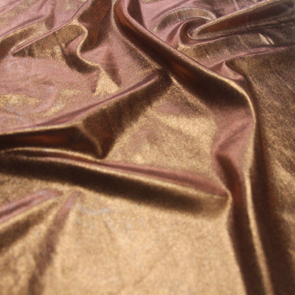 Metallica presenting the Bronze color version of a stretch shiny polyester and spandex blend with good drape