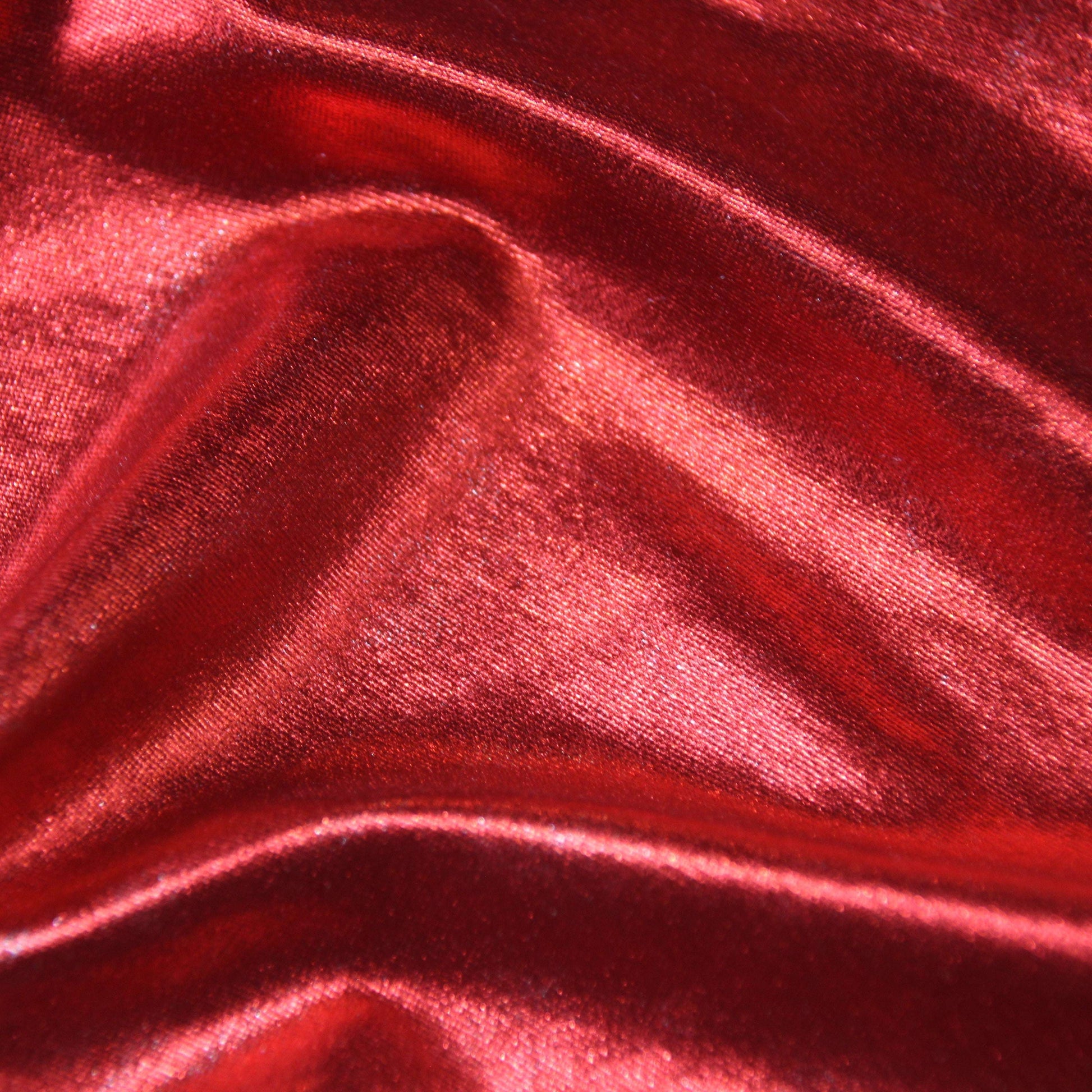 Metallica presenting the Red color version of a stretch shiny polyester and spandex blend with good drape