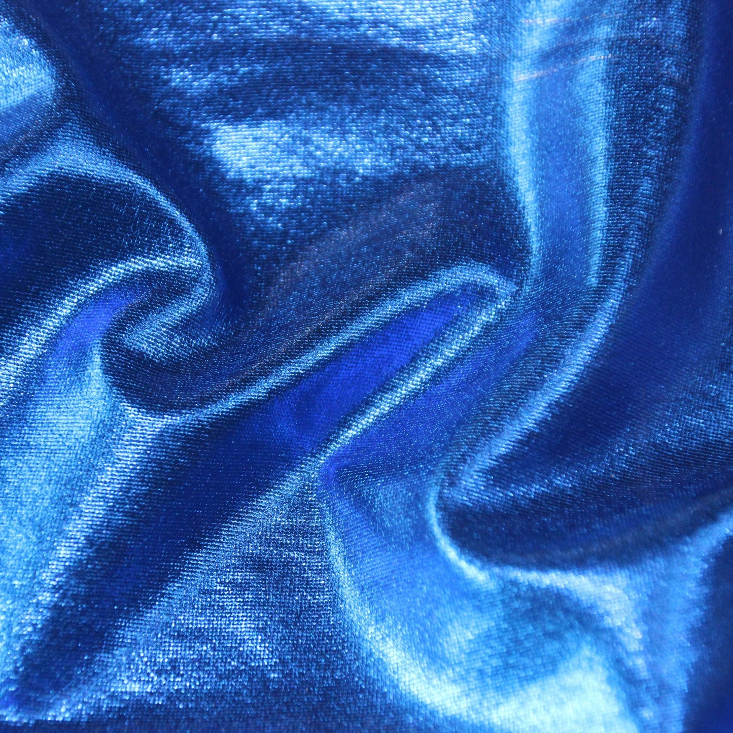 Metallica presenting the Royal color version of a stretch shiny polyester and spandex blend with good drape