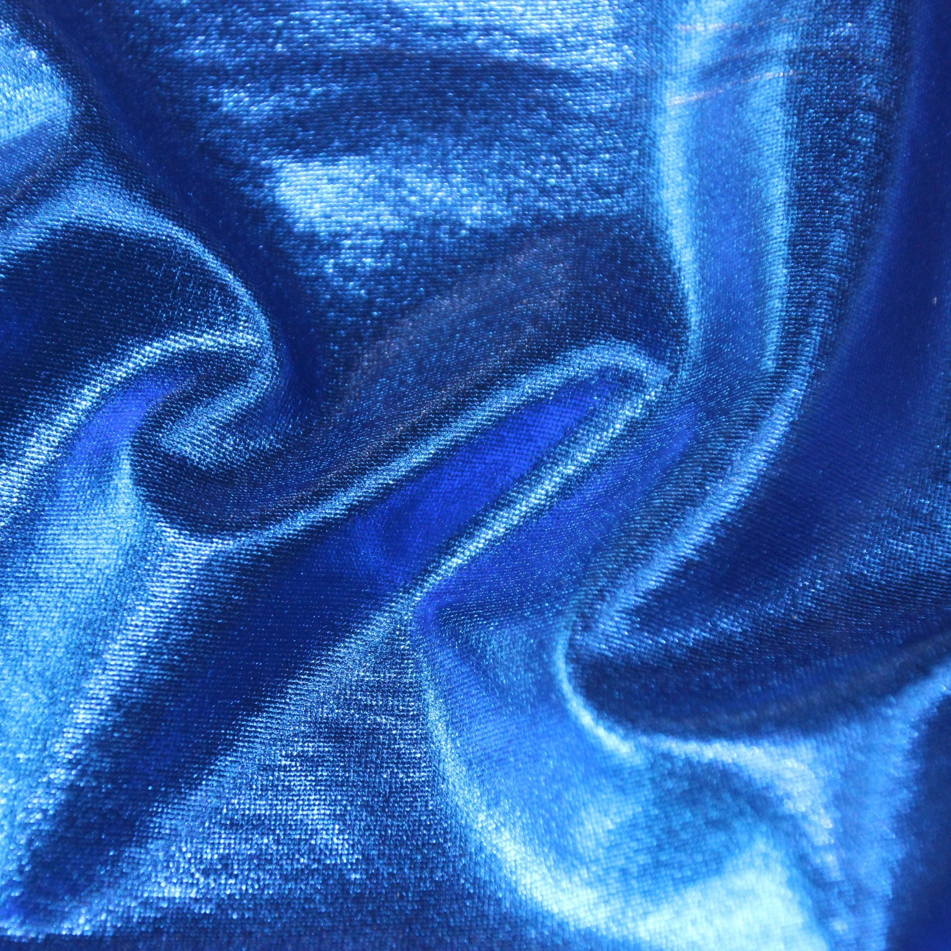 Metallica presenting the Royal color version of a stretch shiny polyester and spandex blend with good drape