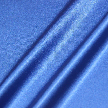 lola presenting the royal color version of a stretch light weight soft satin polyester with spandex