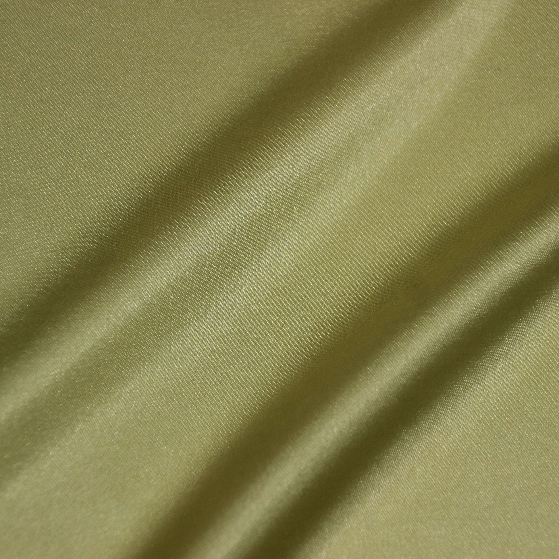 lola presenting the yellow color version of a stretch light weight soft satin polyester with spandex