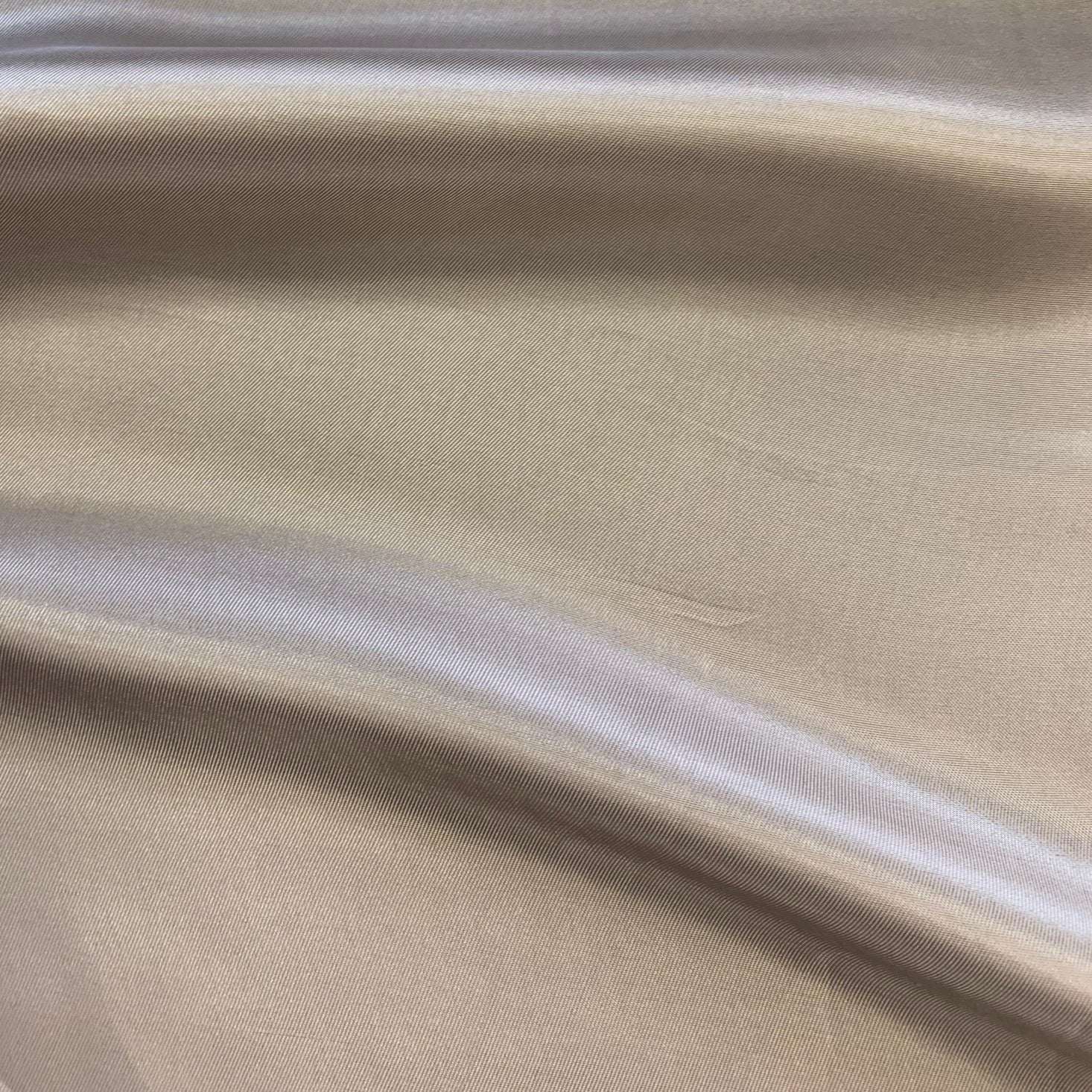 saga showing the ether color version of a pure rayon Fine twill satin with fluid drape
